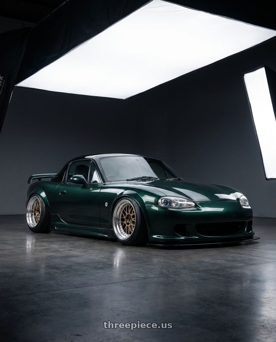 2000 Mazda Miata with Work Meister M1 3p 4x100 16x10+5 O Disk Titanium Gold wheels