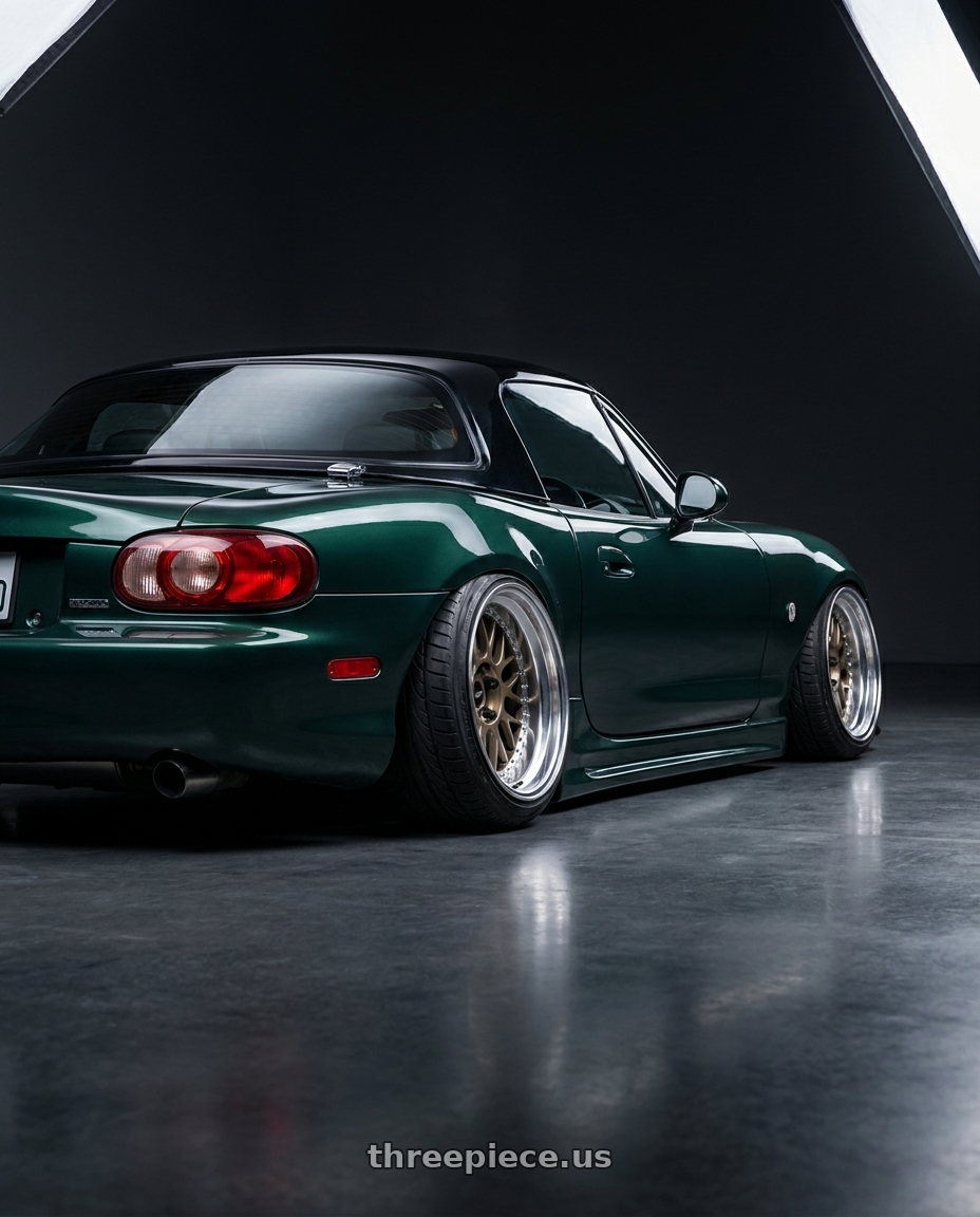 2000 Mazda Miata with Work Meister M1 3p 4x100 16x10+5 O Disk Titanium Gold wheels rear three quarter view extreme stretch tires