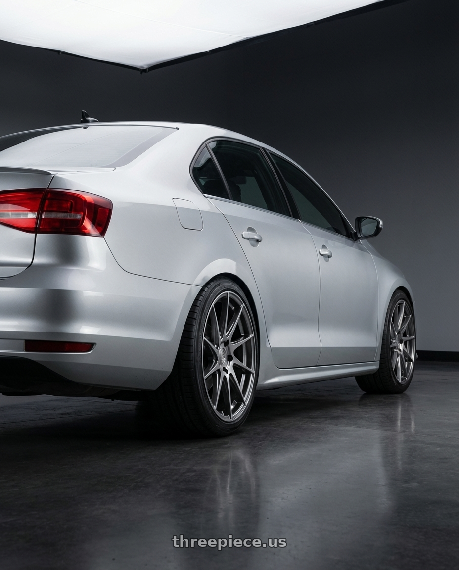 2016 Volkswagen Jetta GLI MK6 with Aodhan AH09 5x112 18x8.5 +35 Hyper Black wheels rear three quarter view square tires