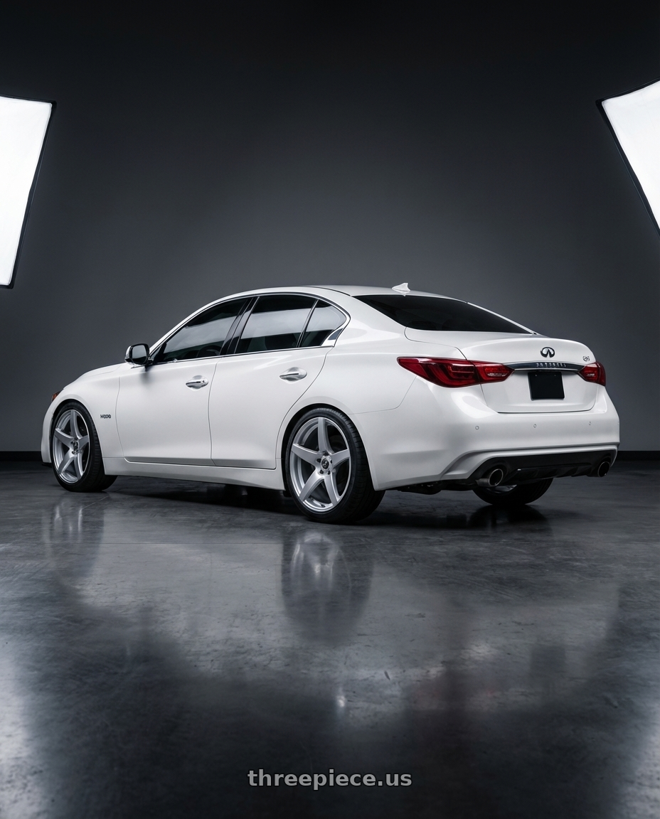 2020 Infiniti Q50 with Forgestar CF5 5x114.3 19x9.5 +29 Gloss Silver wheels rear three quarter view square tires