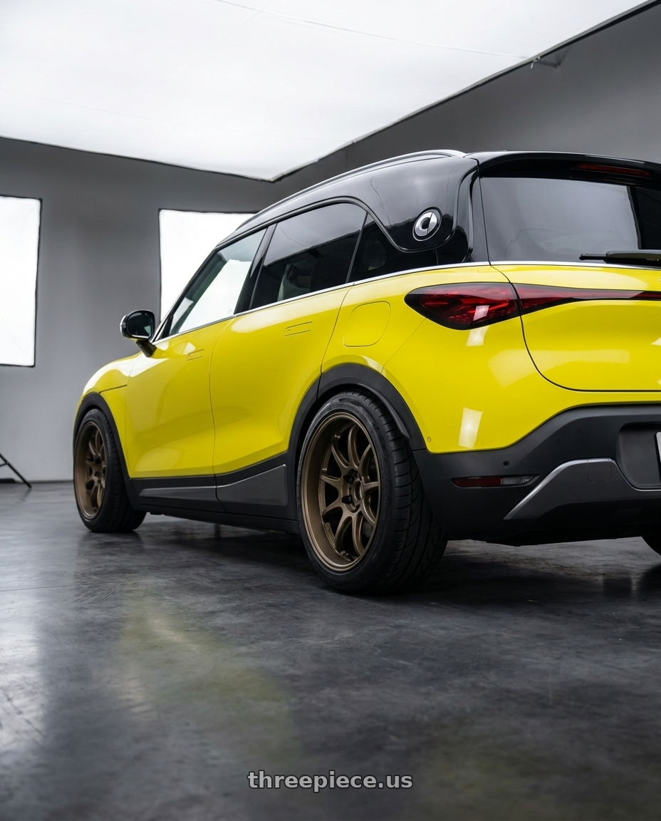 2024 smart #1 with Work Emotion D9r 5x100 18x9.5 +30 Matte Bronze wheels rear three quarter view meaty tires