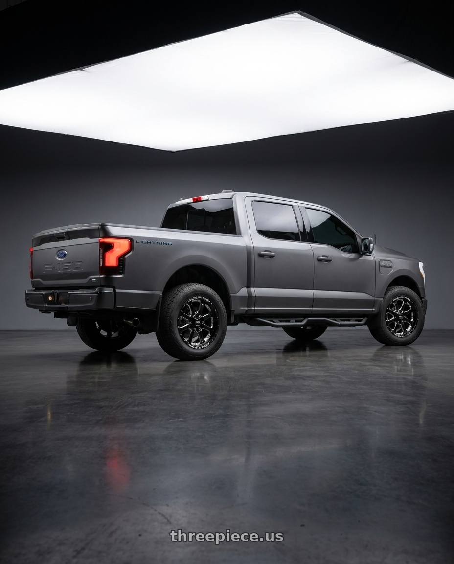 2022 Ford F150 Lariat with WELD Off-Road Granada Six 6x135 20x9 +20 Gloss Black/Milled wheels rear three quarter view slight stretch tires