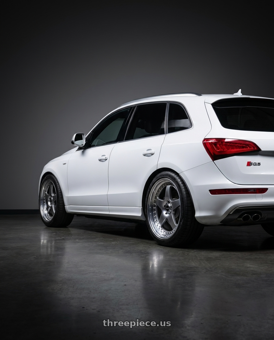 2015 Audi SQ5 Progressiv with SSR Professor SP6 5x112 20X10.5+30 NR Disk Titan Silver wheels rear three quarter view meaty tires