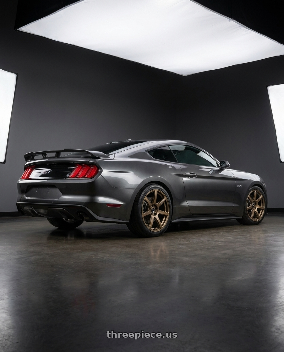 2017 Ford Mustang GT Premium with Work Emotion T7r 5x120 18x8.5 +38 Matte Bronze wheels rear three quarter view square tires