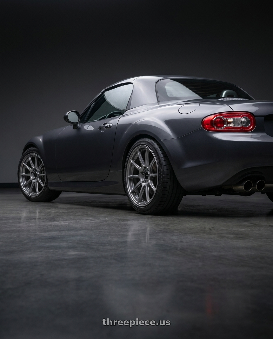 2014 Mazda Miata with Enkei Triumph 5x114.3 17x9+40 Storm Gray wheels rear three quarter view square tires