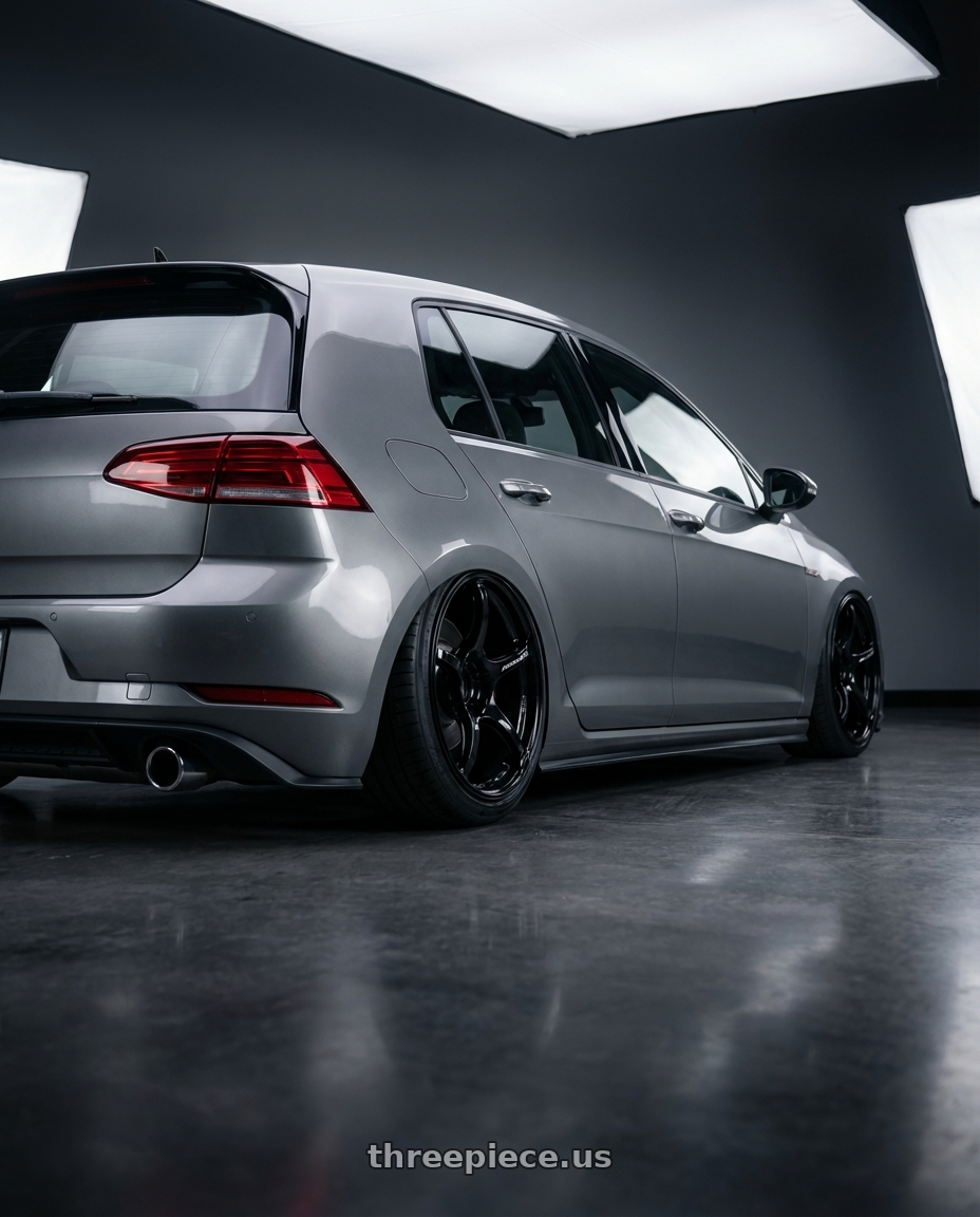 2019 Volkswagen GTI MK7 with Advan RGIII 5x112 19x8.5+45 Gloss Black wheels rear three quarter view slight stretch tires