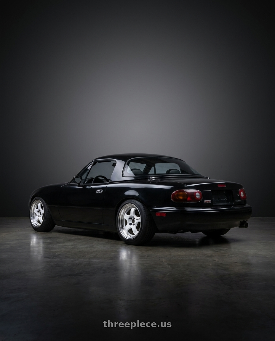 1995 Mazda miata with Work Meister S1 2P 4x100 15x8.5+12 O Disk Black wheels rear three quarter view square tires