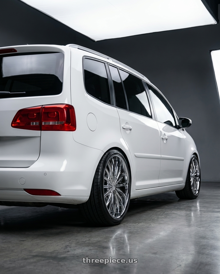 2014 VW Touran tsi with VELOCITY 11 5X114.3/5X120 20x8.5 +35 CHROME wheels rear three quarter view slight stretch tires