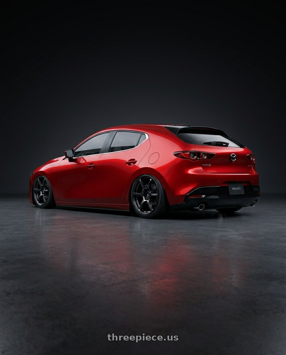 2024 Mazda3 fastback with Advan RGIII 5x114.3 18x8.0+45 Gloss Black wheels rear three quarter view slight stretch tires