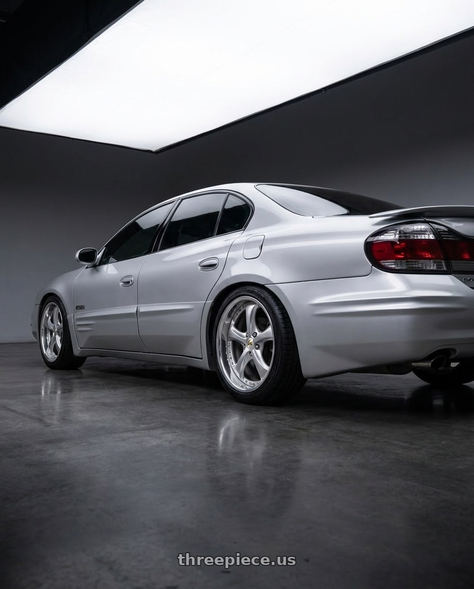2000 Pontiac Bonneville SSEI with Work Wheels VS-KF 5x115 18x8+40 Light Grey Silver A Disk FULL REVERSE wheels rear three quarter view square tires