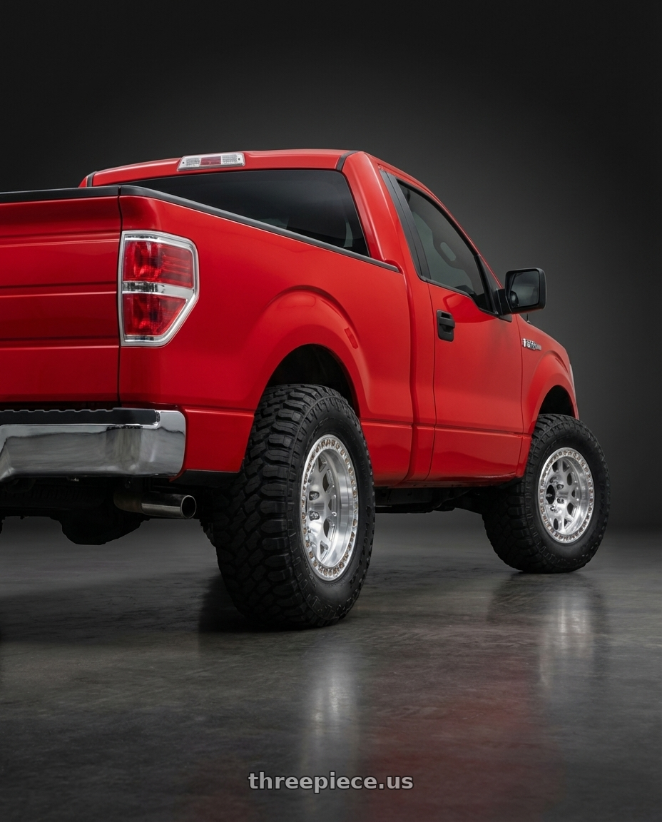 2012 Ford F150 with KMC KM450 MESA FORGED SLOTTED BEADLOCK BLANK 17X9 -12 RAW MACHINED wheels rear three quarter view meaty tires