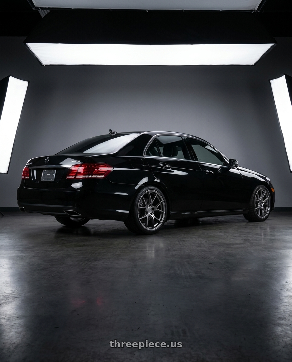2013 Mercedes Benz E3550 4matic with Aodhan AH-11 5x112 18x8.5+35 Hyper Black wheels rear three quarter view square tires