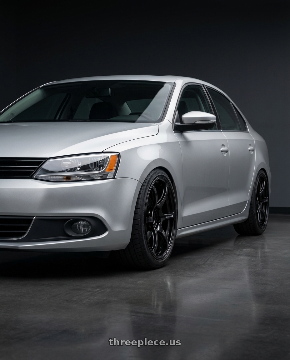 2016 Volkswagen Jetta GLI MK6 with Advan RGIII 5x112 18x8+50 Gloss Black wheels front three quarter view lowered stance