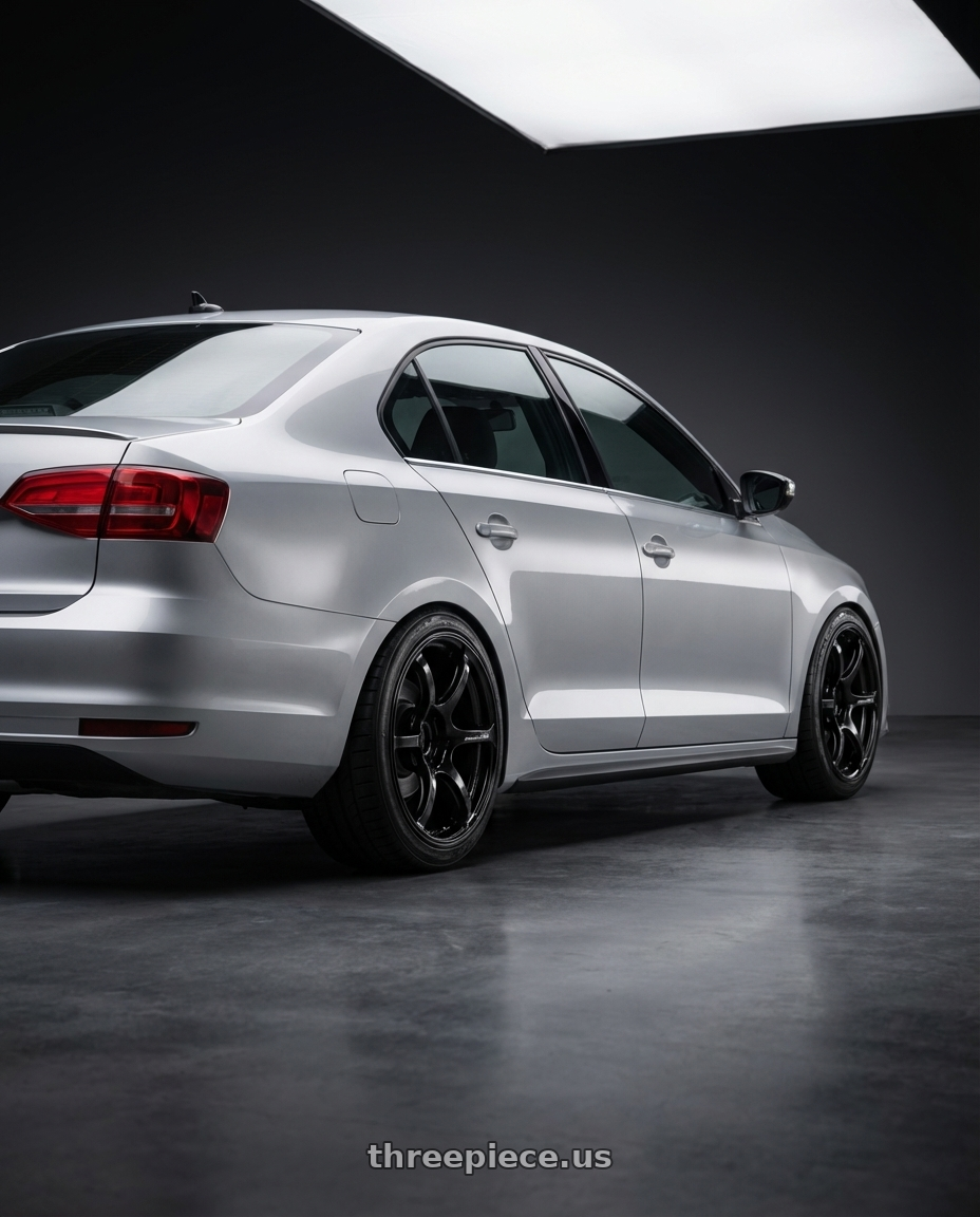 2016 Volkswagen Jetta GLI MK6 with Advan RGIII 5x112 18x8+50 Gloss Black wheels rear three quarter view square tires