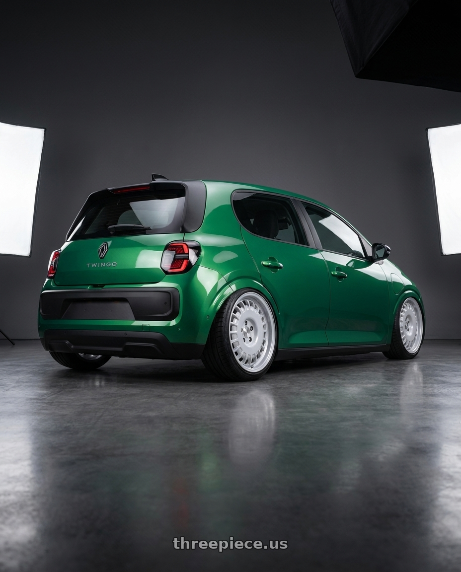 2026 Renault Twingo with Rotiform RC205 PMF 5X108 19x8.5 +45 GLOSS SILVER wheels rear three quarter view slight stretch tires