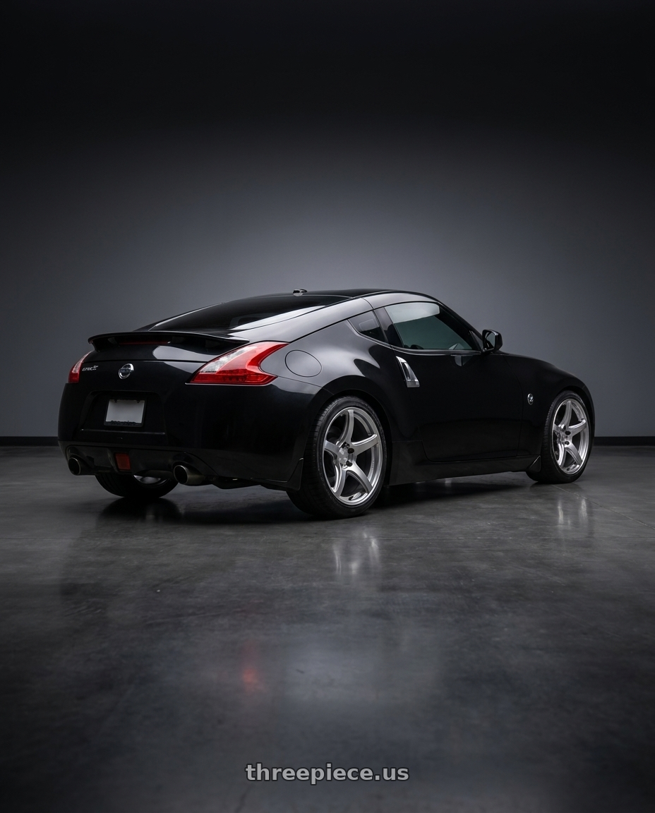 2009 Nissan 370z with Work Emotion T5r 5x114.3 19x9.5 +35 Glow Silver wheels rear three quarter view square tires