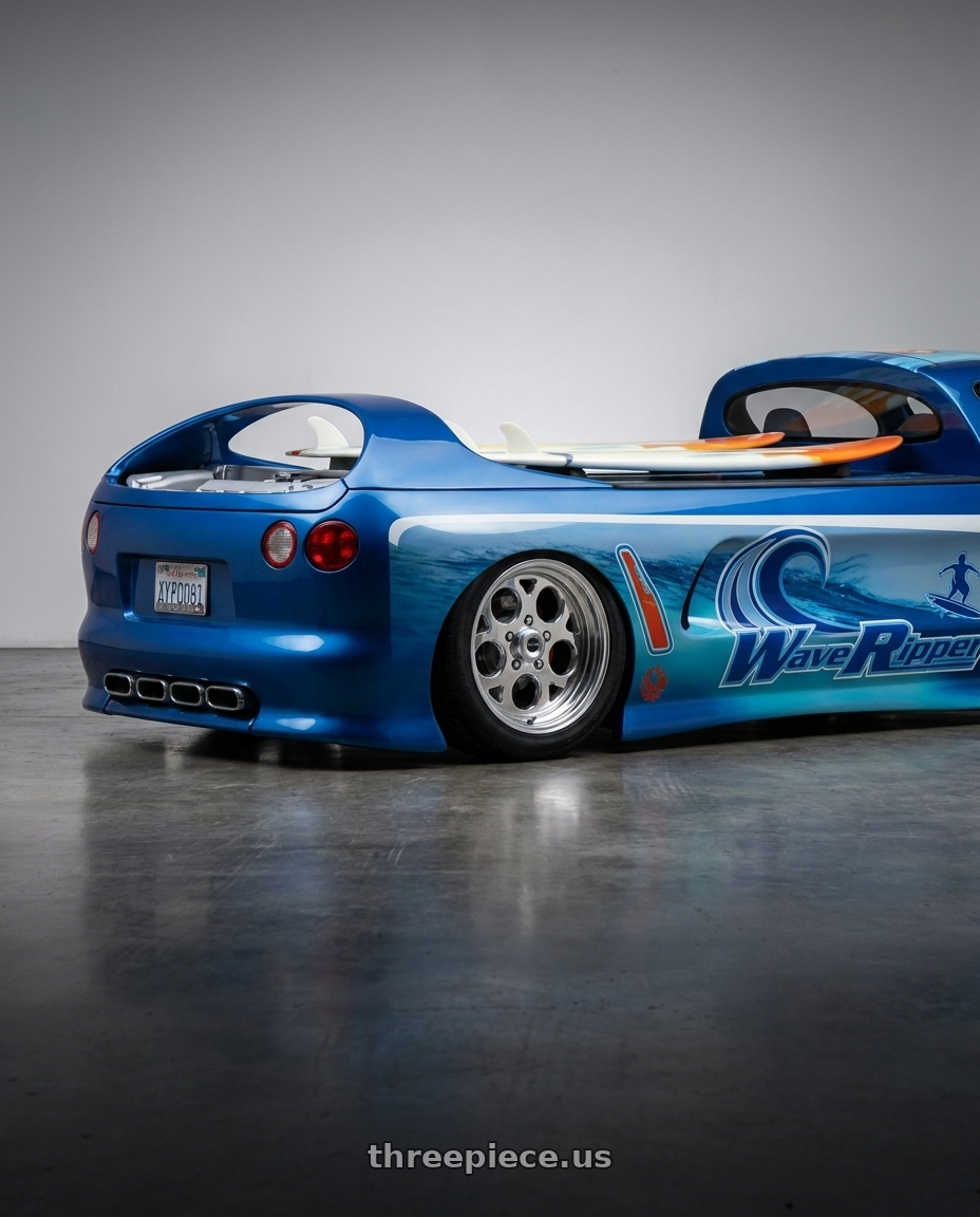 2003 Deora II with Vision American-Muscle 561 Sport Mag 5x114.3 15x7+0 Polished wheels rear three quarter view square tires