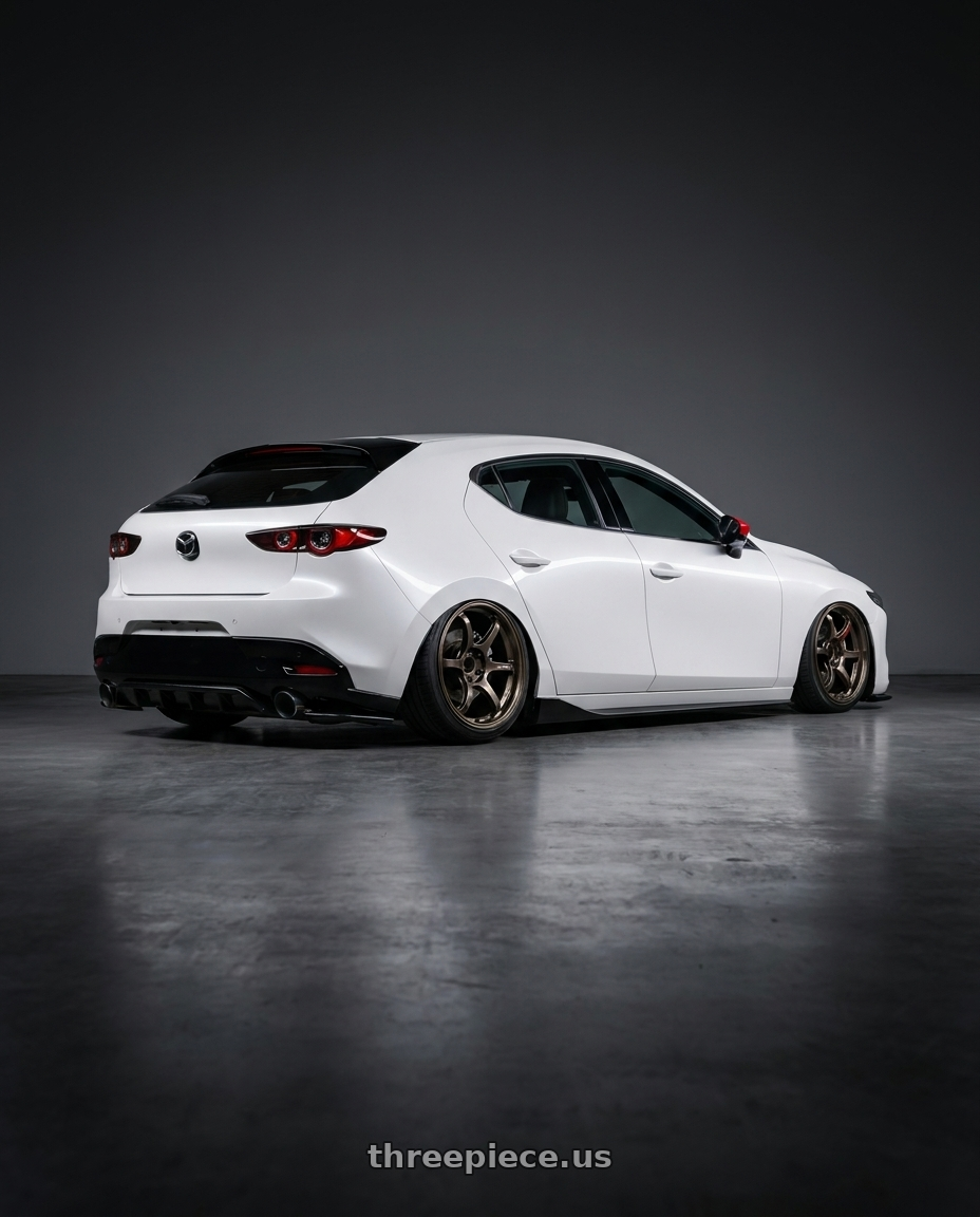 2024 Mazda3 Fastback  with Advan Racing RS-DF Progressive 5x114.3 19x8.5+37 Dark Bronze Metallic wheels rear three quarter view slight stretch tires