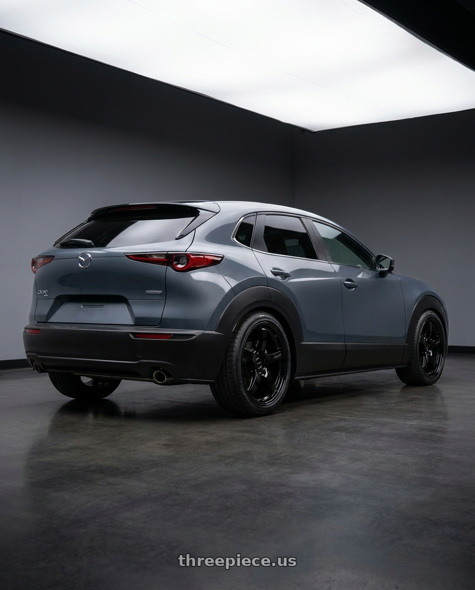 2026 mazda cx-30 with Gram Lights 57CR 5x100 18x9.5+38 Glossy Black wheels rear three quarter view square tires