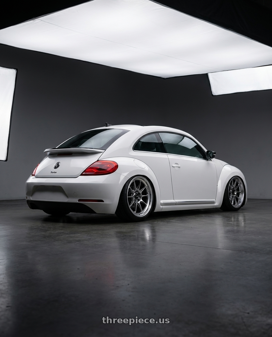 2016 Volkswagen Beetle Turbo with Konig Countergram 5x112 19x8.5+43 Hyper Chrome / Machined Lip wheels rear three quarter view slight stretch tires