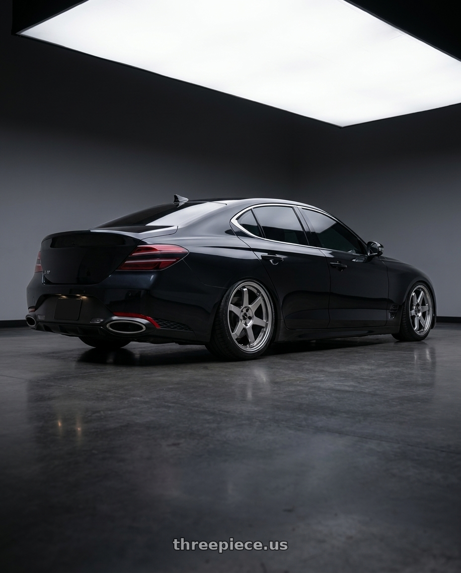 2023 Genesis G70 Victoria Black with Vors TR37 5x114.3 19x8.5  +35 Hyper Black wheels rear three quarter view meaty tires