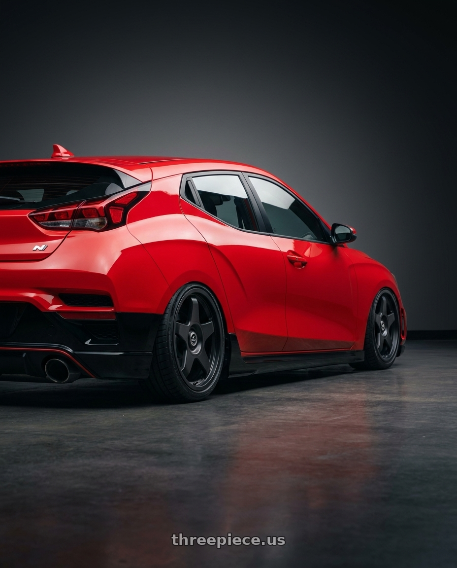 2022 Hyundai Veloster N with fifteen52 CHICANE 5x114.3 / 5x120 19x8.5 +35 ASPHALT BLACK (SATIN BLACK) wheels rear three quarter view slight stretch tires