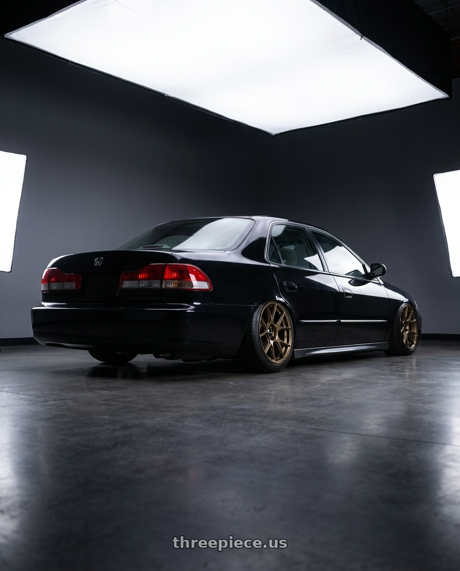 2001 Honda accord LX 4dr with Konig Ampliform 5x120 18x8.5+32 Gloss Bronze wheels rear three quarter view slight stretch tires