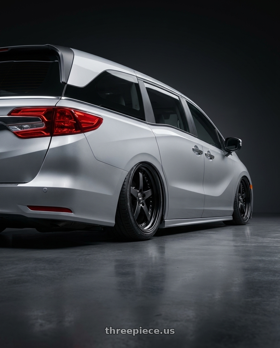 2024 Honda Odyssey  with Work Equip E05 5x120 20x8.5+40 a disk Black Anodized wheels rear three quarter view slight stretch tires