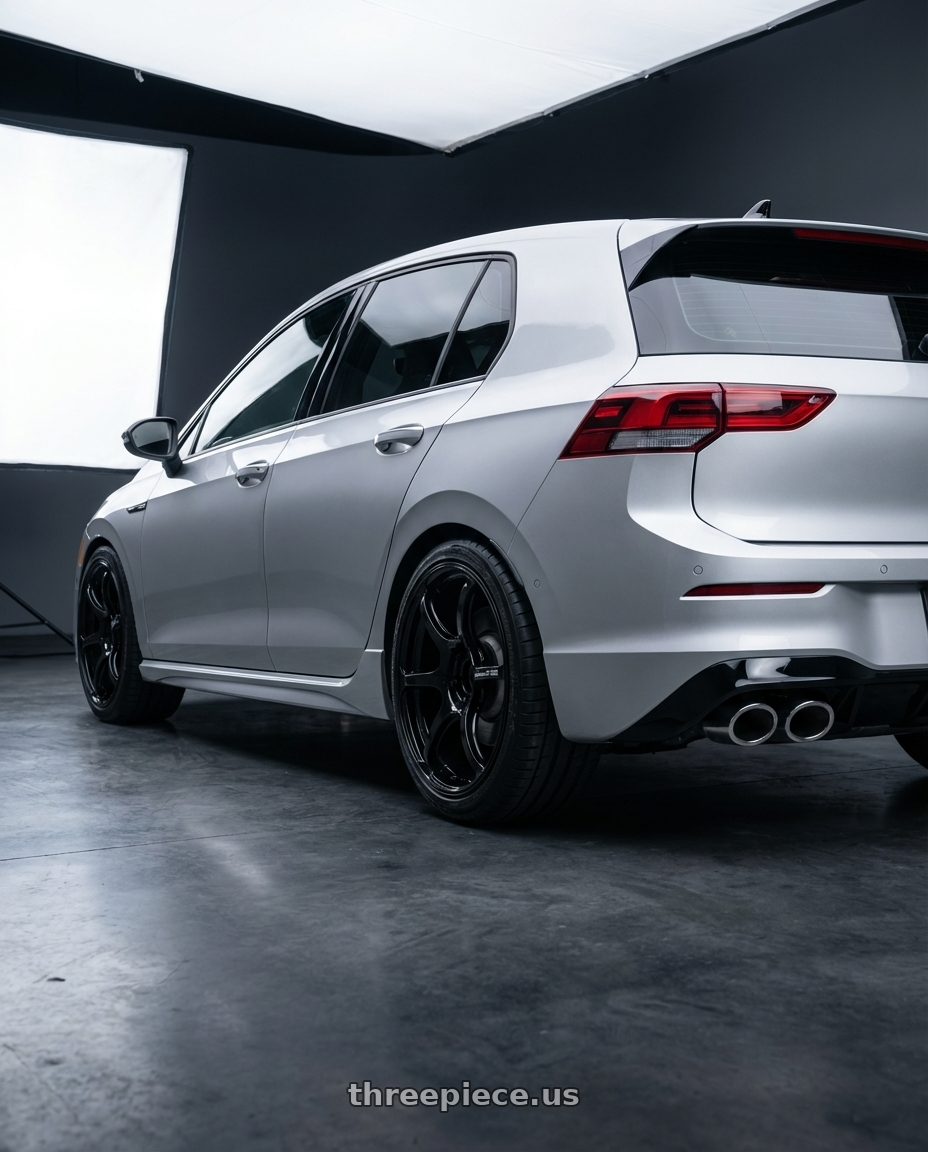 2024 Volkswagen Golf R MK8 with Advan RGIII 5x112 19x8.5+45 Gloss Black wheels rear three quarter view square tires
