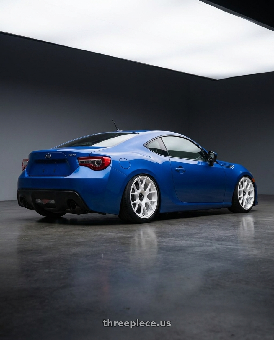 2017 Subaru BRZ with fifteen52 APEX 5x100 / 5x114.3 18x8.5 +35 RALLY WHITE (GLOSS WHITE) wheels rear three quarter view slight stretch tires
