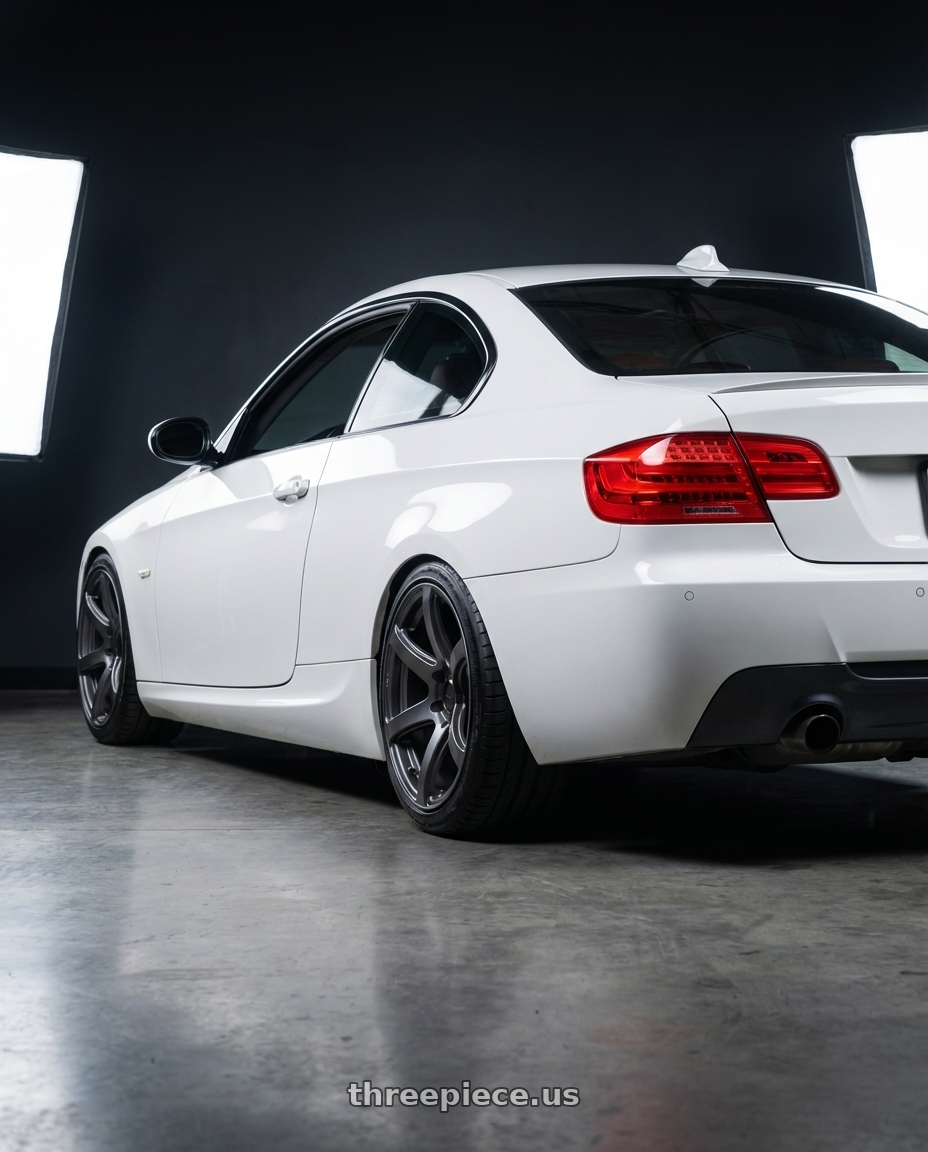 2009 bmw 335i alpine white with Enkei Cyclone 6x139.7 18x9+0 Matte Gunmetal wheels rear three quarter view square tires