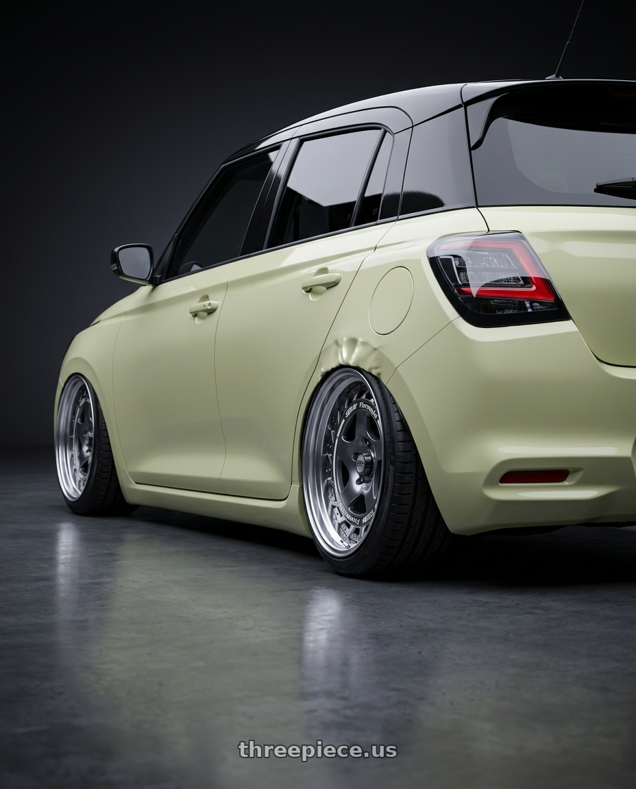 2026 Suzuki swift with FORMULA AERO SPOKE 4x100 16X7+38 NR Disk Titan Silver wheels rear three quarter view square tires
