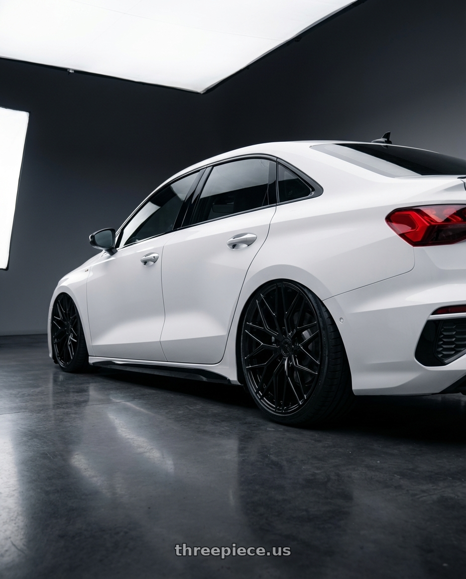 2024 Audi S3 8Y with Avant Garde Wheels M520R 5X112 19x9.5 +40 Gloss Black wheels rear three quarter view slight stretch tires