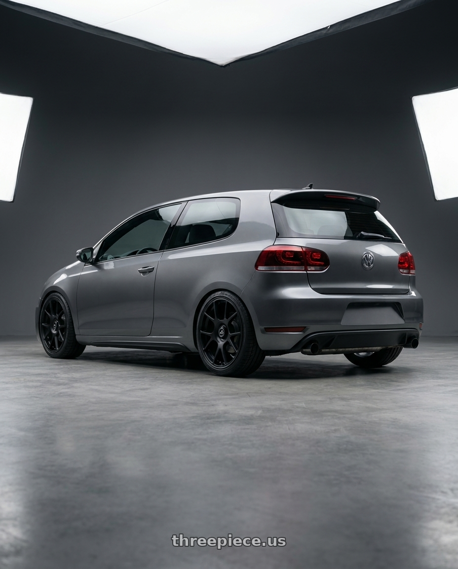 2013 Volkswagen GTI MK6 with fifteen52 COMP 5x112 / 5x120 18x8.5 +35 ASPHALT BLACK (SATIN BLACK) wheels rear three quarter view square tires