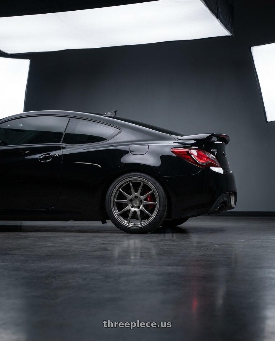 2015 Hyundai Genesis coupe with Aodhan DS02 5x114.3 18x8.5+35 Hyper Black wheels rear three quarter view slight stretch tires