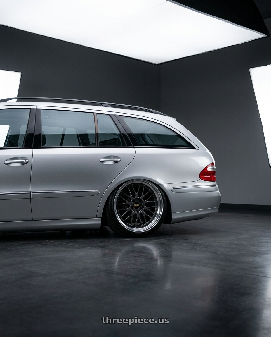 2004 S211 e320 with BBS LM 5x112 19x9.5+32 Diamond Black wheels rear three quarter view slight stretch tires