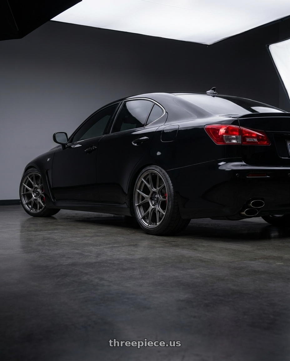 2010 Lexus IS F with Konig Ampliform 5x114.3 19x9.5+35 Dark Metallic Graphite wheels rear three quarter view square tires