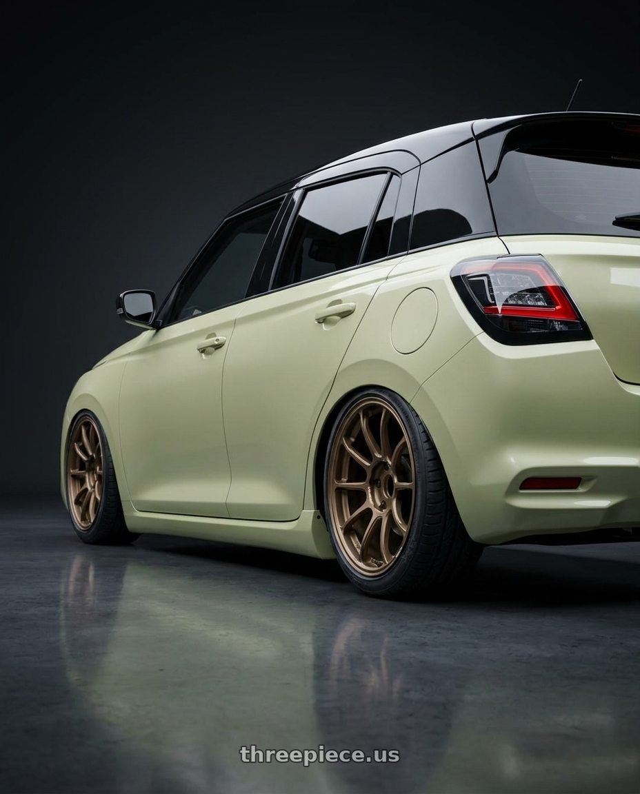 2026 Suzuki swift with Volk Racing ZE40 4x100 16x7.0+36 Bronze Almite wheels rear three quarter view square tires
