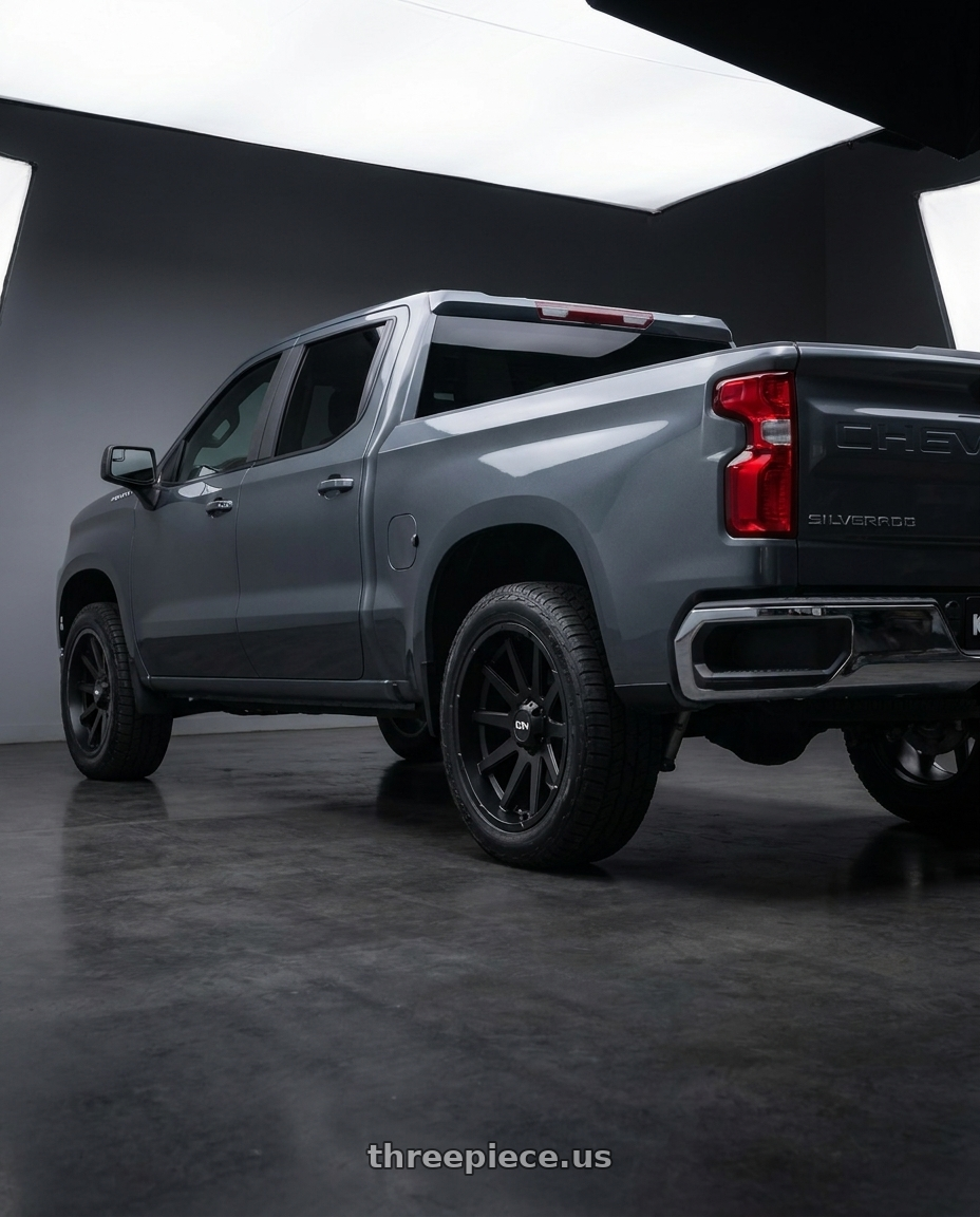2021 Chevrolet Silverado 1500 LT with Ion Type 143 6x139.7 20x10-19 Matte Black wheels rear three quarter view square tires
