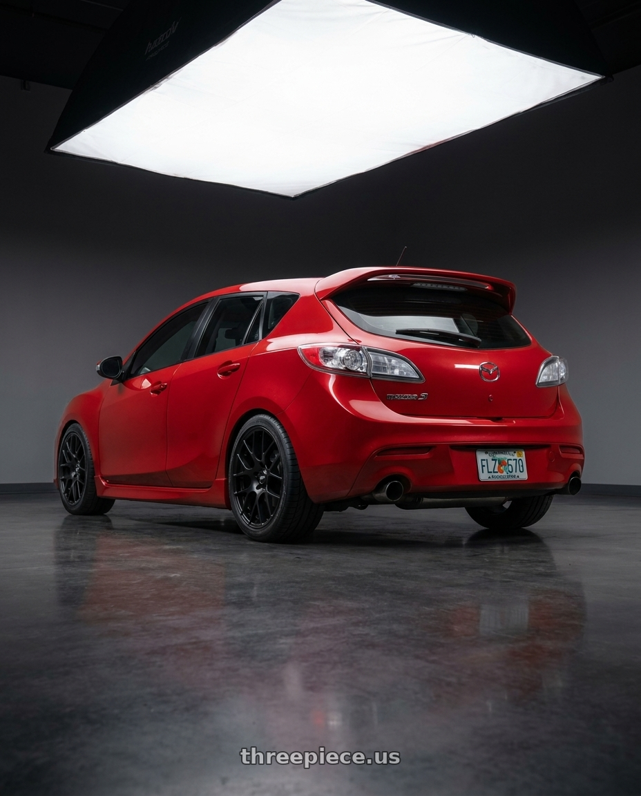 2012 Mazda Mazdaspeed 3 Red with Enkei Raijin 5x114.3 18x9.5+35 Black wheels rear three quarter view square tires