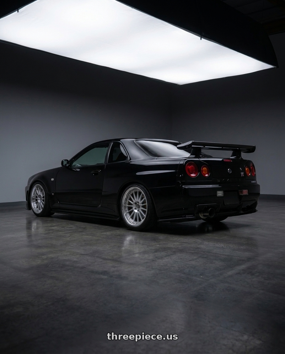2000 nissan skyline with SSR Professor SP5 5X100 18X9.5+-13 HP Disk High Bright Silver wheels rear three quarter view square tires