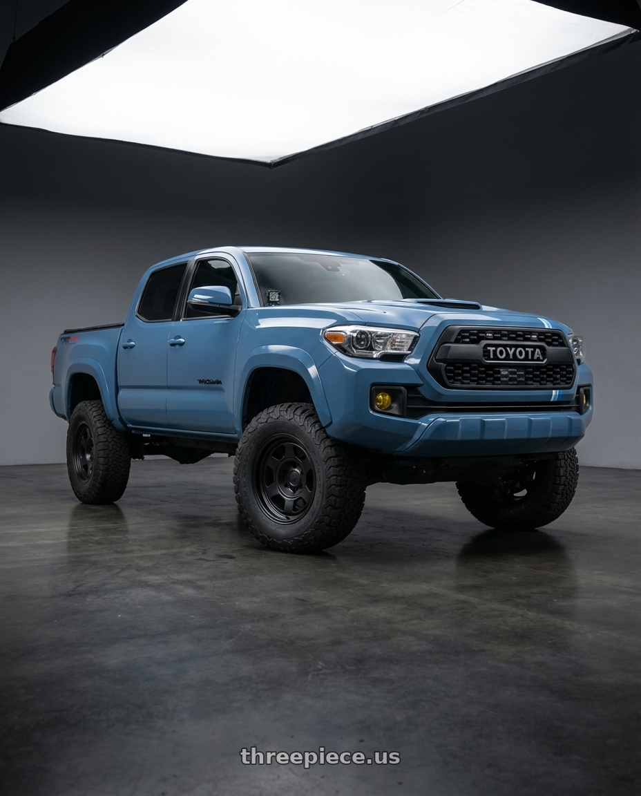 2019 Toyota Tacoma TRD Sport with fifteen52 PATROL HD 6x139.7 17x8.5 +0 ASPHALT BLACK (SATIN BLACK) wheels front three quarter view lifted stance