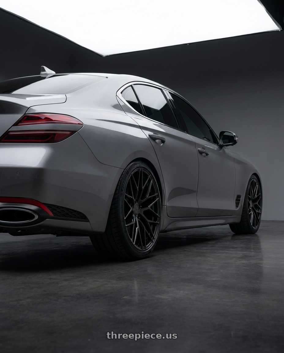 2023 genesis G70 with Avant Garde Wheels M520R 5X114.3 20x10 +35 Gloss Black wheels rear three quarter view slight stretch tires
