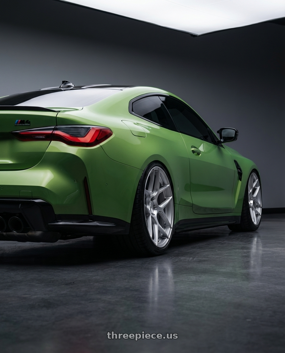 2024 BMW M4 G82 with Aodhan AFF2 5x112 19x8.5+35 Gloss Silver Machined Face wheels rear three quarter view slight stretch tires