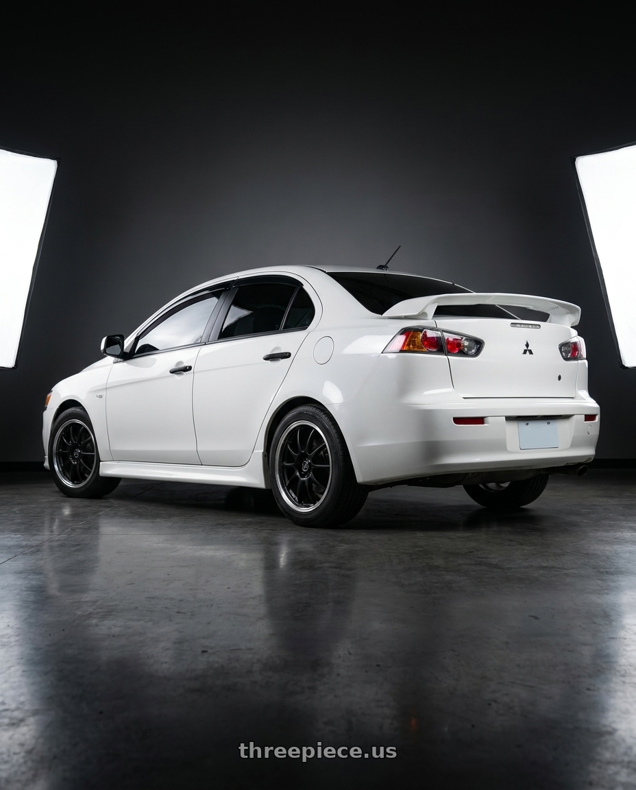 2012 Mitsubishi fortis with Enkei J10 5x100/114.3 16x7+38 Matte Black W/ Machined Lip wheels rear three quarter view square tires