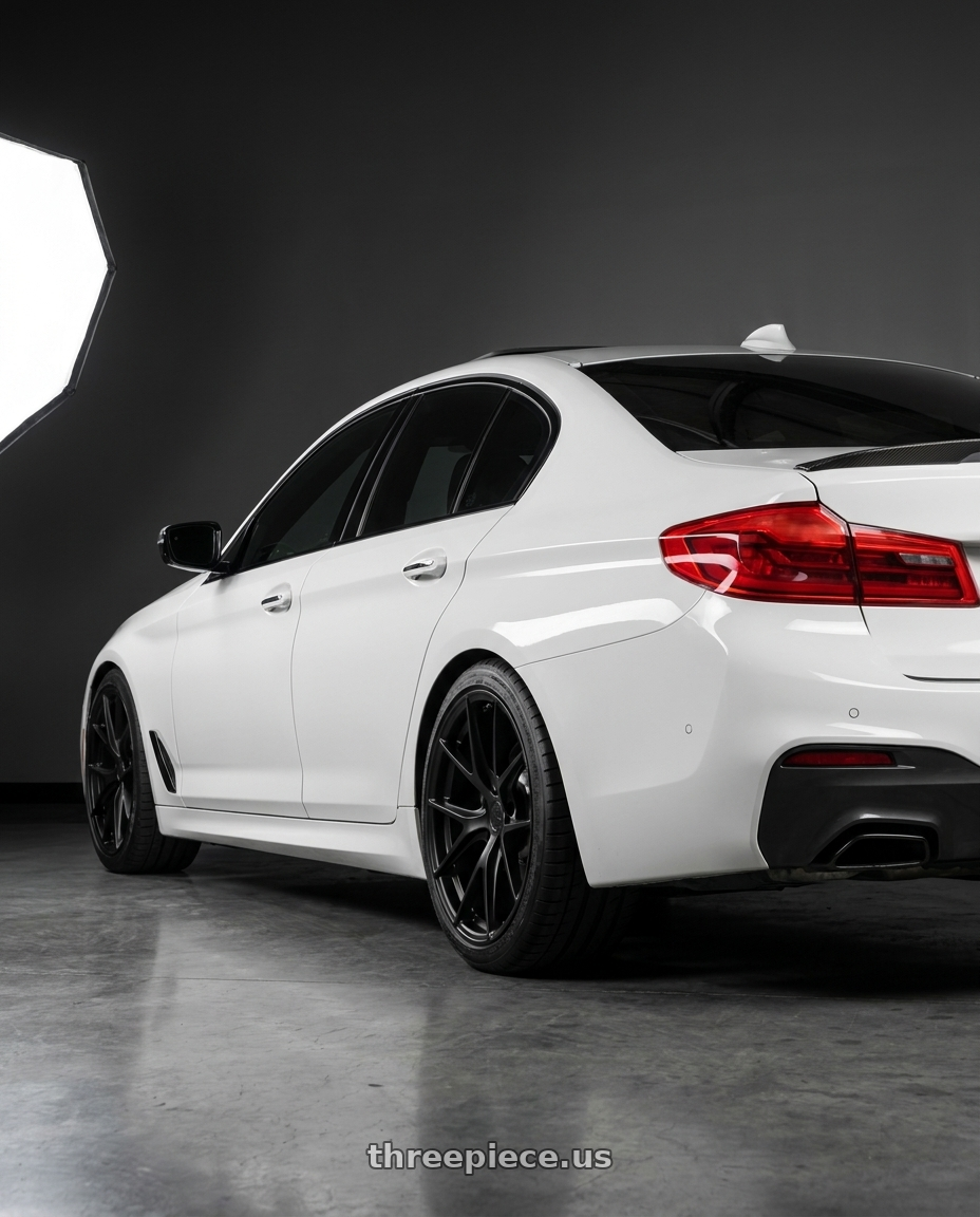 2019 Bmw 540i Msport  with Aodhan AFF7 5x112 19x8.5+35 Matte Black wheels rear three quarter view square tires