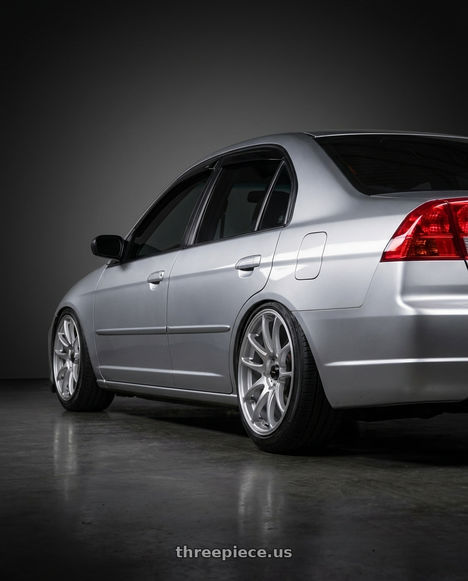 2002 Honda civic ex with Vors TR4 5x100 17x8  +35 Silver Machine Face wheels rear three quarter view slight stretch tires