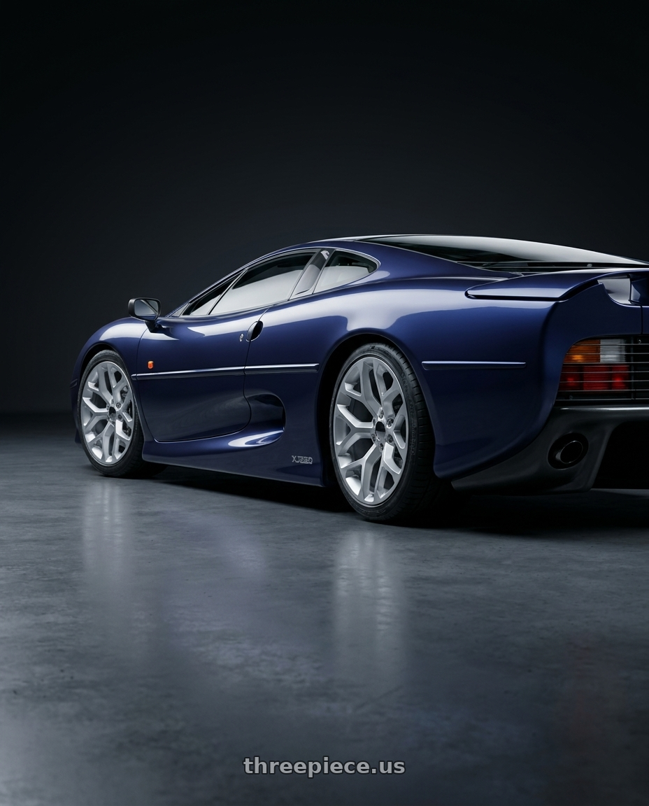 1994 jaguar xj220, serene indigo with Strada OE Replica Snowflake 6x139.7 20x9 +24 Silver Machined wheels rear three quarter view slight stretch tires