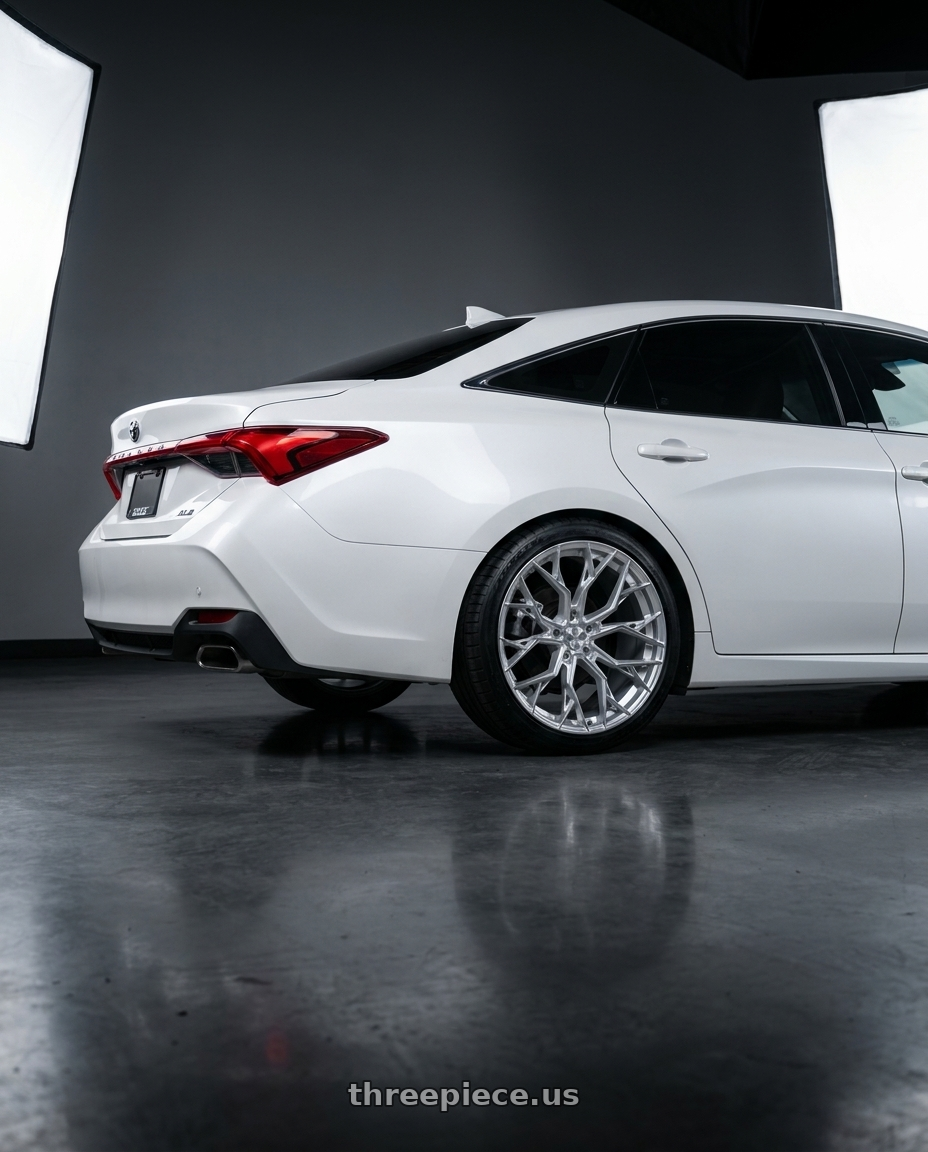 2022 Toyota Avalon XLE white with DOLCE PERFORMANCE ARIA 5x114.3 18x8.5 +35 Gloss Silver Machined Face wheels rear three quarter view square tires