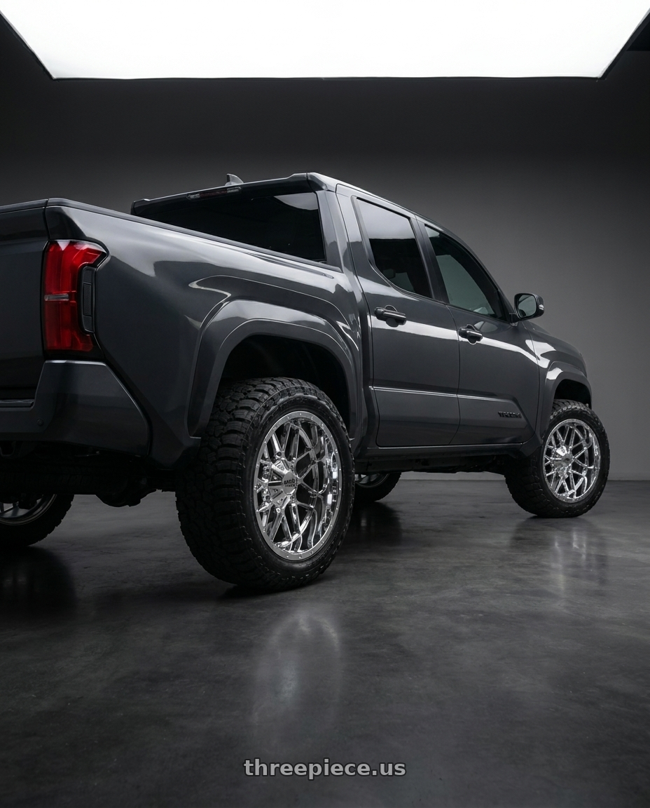 toyota tacoma 4th gen 2024 sr rwd with Moto Metal MO986 SIEGE 6X135/6X139.7 20X9 +0 CHROME wheels rear three quarter view meaty tires